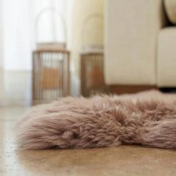 Unshorn Sheepskin Beige 2 ft. x 3 ft. Animal Shape Area Rug by Home Decorators Collection -Floorzy Sales Shop beige home decorators collection area rugs l201040100o2100 40 1000