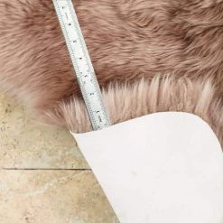 Unshorn Sheepskin Beige 2 ft. x 3 ft. Animal Shape Area Rug by Home Decorators Collection -Floorzy Sales Shop beige home decorators collection area rugs l201040100o2100 66 1000