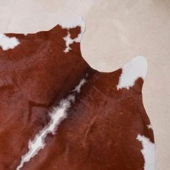 Natural Cowhide Brown and White 5 ft. x 7 ft. Animal Shape Area Rug by Home Decorators Collection -Floorzy Sales Shop brown and white home decorators collection area rugs v301000001brwh 1d 1000