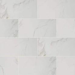 Carrara 12 in. x 24 in. Polished Porcelain Stone Look Floor and Wall Tile (16 sq. ft./Case) by Home Decorators Collection