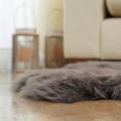 Unshorn Sheepskin Grey 2 ft. x 3 ft. Animal Shape Area Rug by Home Decorators Collection -Floorzy Sales Shop grey home decorators collection area rugs l201470000o2600 40 1000