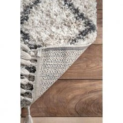 Transitional Kristi Shag Ivory 10 ft. x 14 ft. Indoor Area Rug by Home Decorators Collection -Floorzy Sales Shop ivory home decorators collection area rugs kkel02a 10014 44 1000