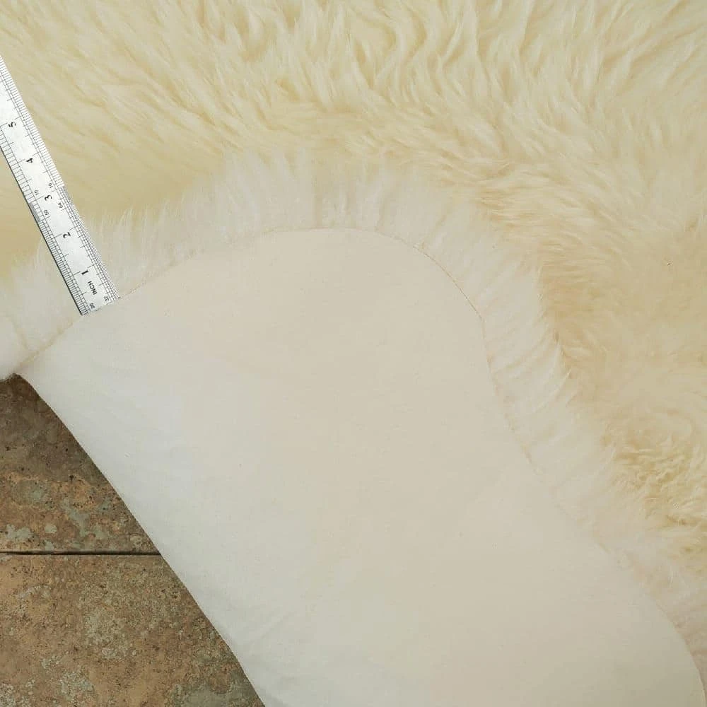 Unshorn Sheepskin White 2 ft. x 3 ft. Animal Shape Area Rug by Home Decorators Collection 6 Unshorn Sheepskin White 2 ft. x 3 ft. Animal Shape Area Rug by Home Decorators Collection - Image 6